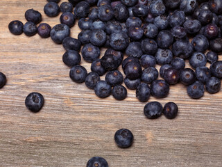 Blueberries on wood background