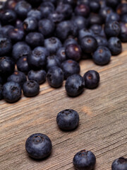 Organic blueberries on wood background