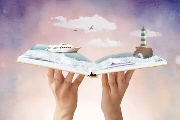 Hands holding open book with magic seascape on light background