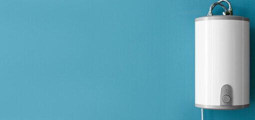 Modern electric boiler on blue background with space for text