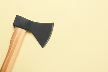 Ax on yellow background, top view