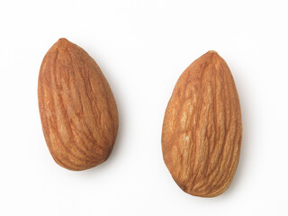Closeup of two almonds on white