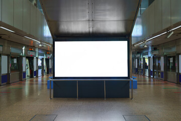 Blank billboard in subway or metro station, Useful for advertising.