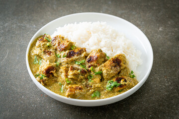 Afghani chicken in green curry or Hariyali tikka chicken hara masala with rice