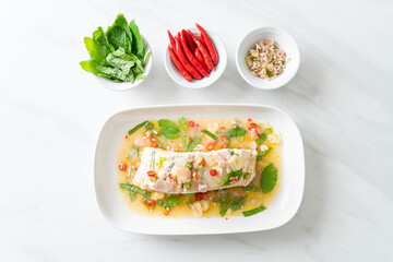 steamed sea bass fish with herbs