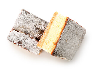 Pieces of delicious cheese pie with sugar powder on white background