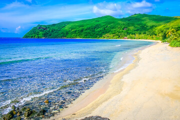 Tropical sandy beach at summer day in Fiji Islands, Pacific ocean