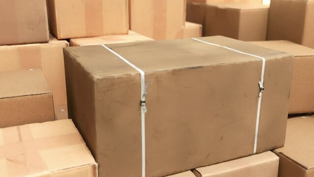Closeup Slow motion Parcel boxes in factory industry. 3D animation. Business ecommerce logistic concept idea.	 