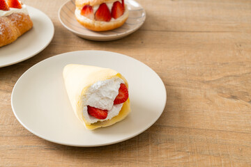 fresh strawberry cream crepe on plate
