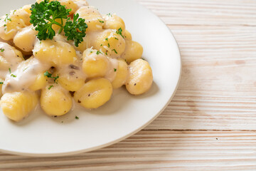 Gnocchi with mushroom cream sauce and cheese