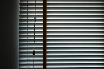 white blinds curtain put on the window, interior design