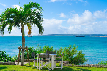 Emerald blue sea and palm trees on Miyako Island, Okinawa, Japan