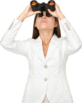 Young businesswoman looking through binoculars isolated on white background. PNG, transparent isolated cutout, Can be superimposed on other image or background.