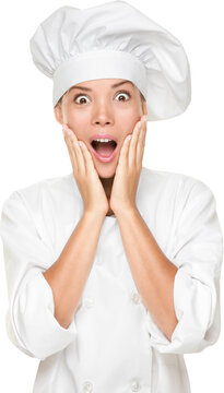 Chef or baker surprised excited and shocked. Woman in chefs uniform and hat looking at camera in shock with surprise. Beautiful young multicultural Asian / Caucasian woman chef isolated on white. PNG,