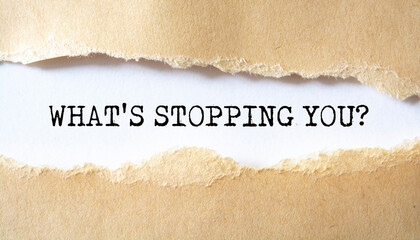 What's Stopping You? question written under torn paper.
