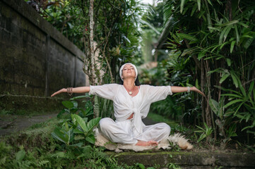 Girl practice yoga meditation outdoor in park