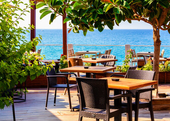 Side city (Antalya region), Turkey. Aug. 15 - 2022. Beautiful cafe on the beach at sunny morning
