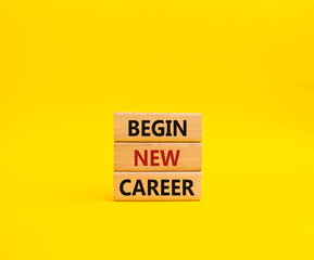 Begin new career symbol. Concept word Begin new career on wooden blocks. Beautiful yellow background. Business and Begin new career concept. Copy space