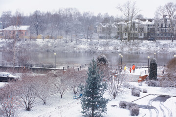 Winter landscape. Trees and plants covered with snow. The beauty of snow covered paths. Snowfall and cooling in tourist areas.