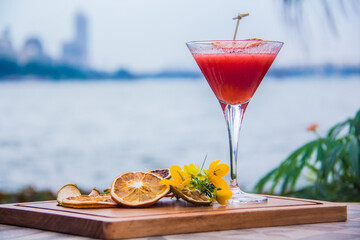 A fruits cocktail Drink and Juice, shot is selective focus with shallow depth of field. Photos taken at Cairo Egypt with a Nile view