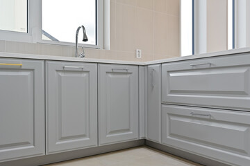 Kitchen doors finished with wainscoting interior