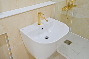 The faucet is in gold color, which gives it a very luxurious feel