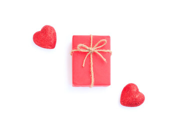 Red gift box with bow and Red glitter heart isolated on white background