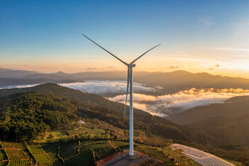 PANORAMIC VIEW OF WIND FARM OR WIND PARK, WITH HIGH WIND TURBINES FOR GENERATION ELECTRICITY WITH...