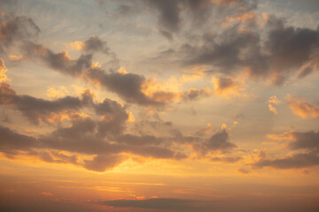 Colorful clouds at sunset as background.