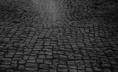 Paving stone vintage road cover. Evening road in a historical place. Old square cobblestone paving...