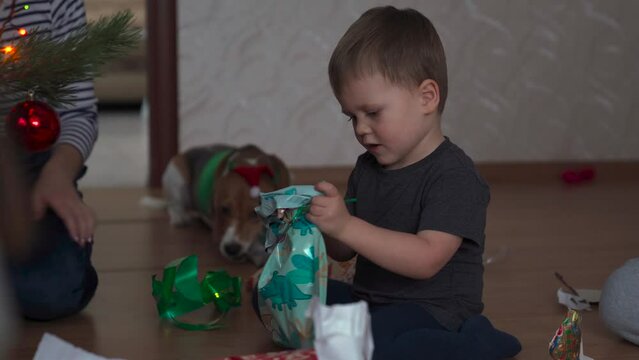 Kid Opens Christmas Gifts Christmas Tree