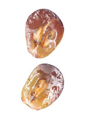 Sliced red grape isolated on white background.