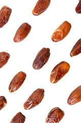 Dried dates isolated on white background.