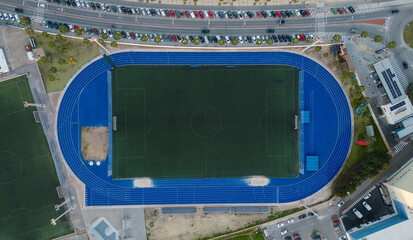 Aerial photography of a football stadium with an athletics track. Training ground. Speedway. Marathon.