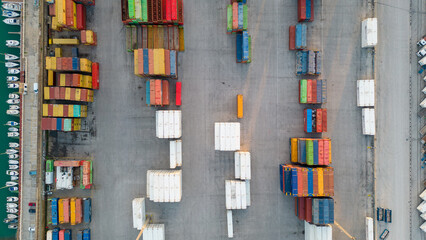 Obraz premium Aerial image of logistics platform with containers to import and export materials by ship 