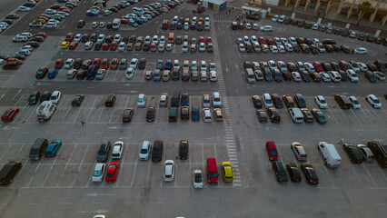 Parking. Aerial view of cars parked in line in a parking lot. Colored cars. drone view	