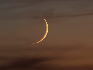 View of crescent moon at dusk