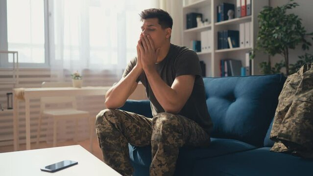 Frustrated military man feeling sadness, life problems, missing family, ptsd