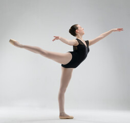 Female ballet dancer with ballet shoes and black body for auditions