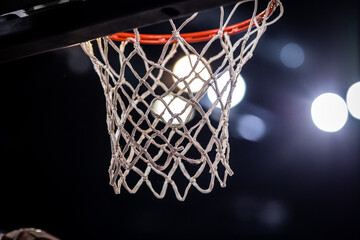 Fototapeta na wymiar basketball game ball in hoop