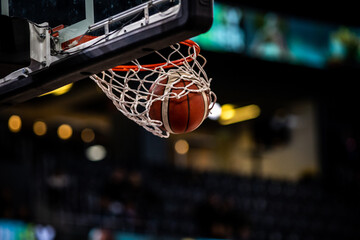 basketball game ball in hoop