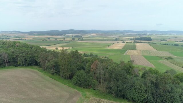 Rural landscape with agricultural fields, trees and meadows, Germany