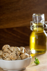 Canned garlic in a white bowl