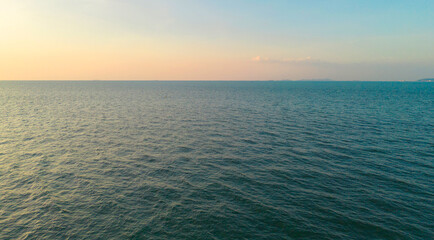 Aerial view of boats with clear blue turquoise seawater, Andaman sea in Phuket island in summer season, Thailand. Water in ocean material pattern texture wallpaper background.