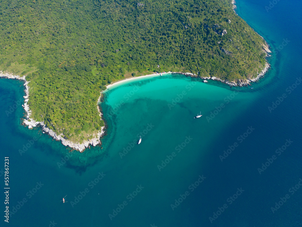 Wall mural Aerial view of boats with clear blue turquoise seawater, Andaman sea in Phuket island in summer season, Thailand. Water in ocean material pattern texture wallpaper background.