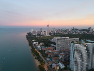 Aerial view of Pattaya sea, beach in Thailand in summer season, urban city with blue sky for travel background. Chon buri skyline.