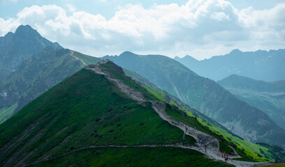 Obraz premium Beautiful view of the Tatra Mountains landscape. View of the mountains from the top. High mountain landscape.