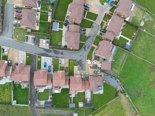 Drone top down view of a new housing development previously on a brown field site in the heart of...
