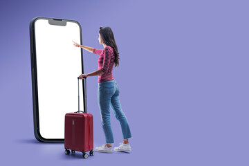 Woman using a travel app on smartphone - obrazy, fototapety, plakaty