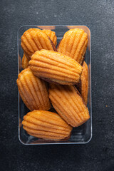 Madeleine biscuit cookies sweet French dessert meal food snack on the table copy space food background top view